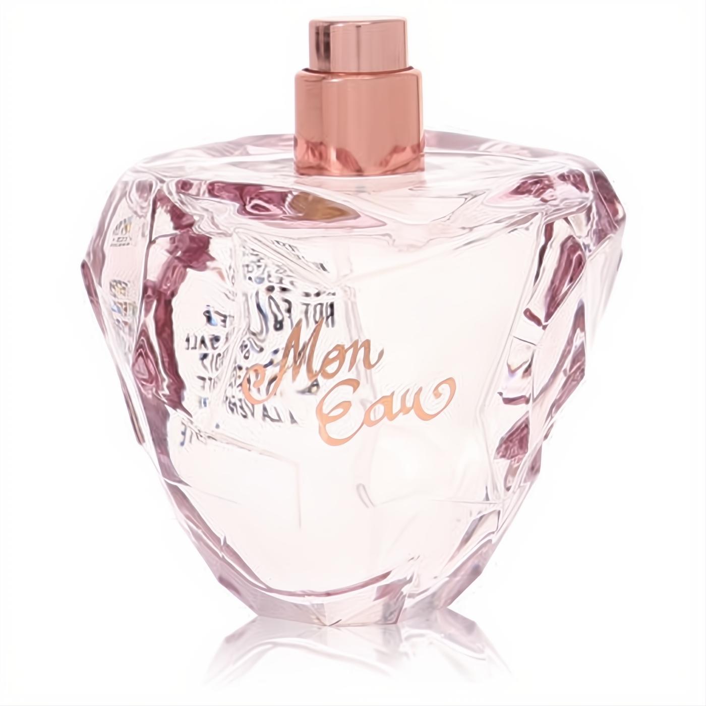 Lolita Lempicka Mon Eau women's perfume in a sparkling faceted pink glass bottle with a rose gold cap and elegant script.