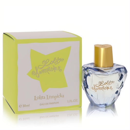 Lolita Lempicka 1 oz Eau De Parfum: clear, faceted glass bottle with gold cap next to a vibrant lime green box.