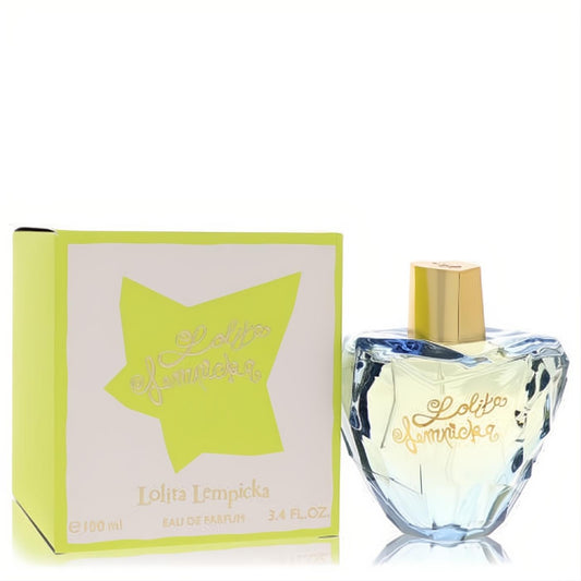 Iconic Lolita Lempicka Eau de Parfum 3.4 oz. Clear faceted bottle with gold cap and vibrant lime green box with gold script.