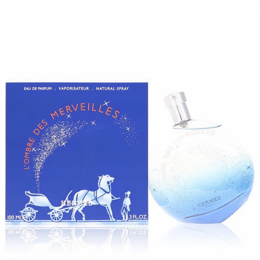 Hermes L'Ombre Des Merveilles 3.3 oz EDP spray. Elegant round blue gradient bottle and deep blue box with a sparkling carriage design.