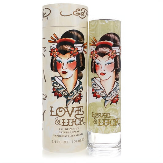 Love & Luck 3.4 oz Eau De Parfum spray. Features a vibrant geisha tattoo art design on a sleek glass bottle and decorative box.