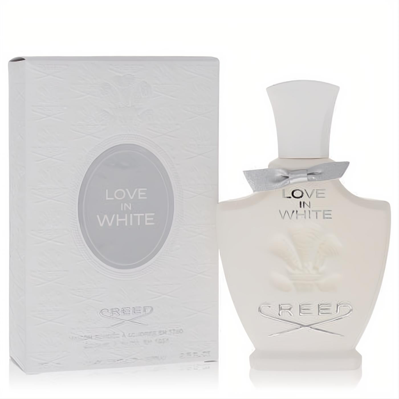 Iconic Creed Love in White 2.5 oz Eau De Parfum spray. Elegant frosted white bottle, chic silver bow, and signature branding.