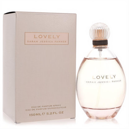 Lovely SJP Eau de Parfum 5.2 oz spray. Elegant clear bottle with light pink fragrance, ribbed cap, and matching champagne box.