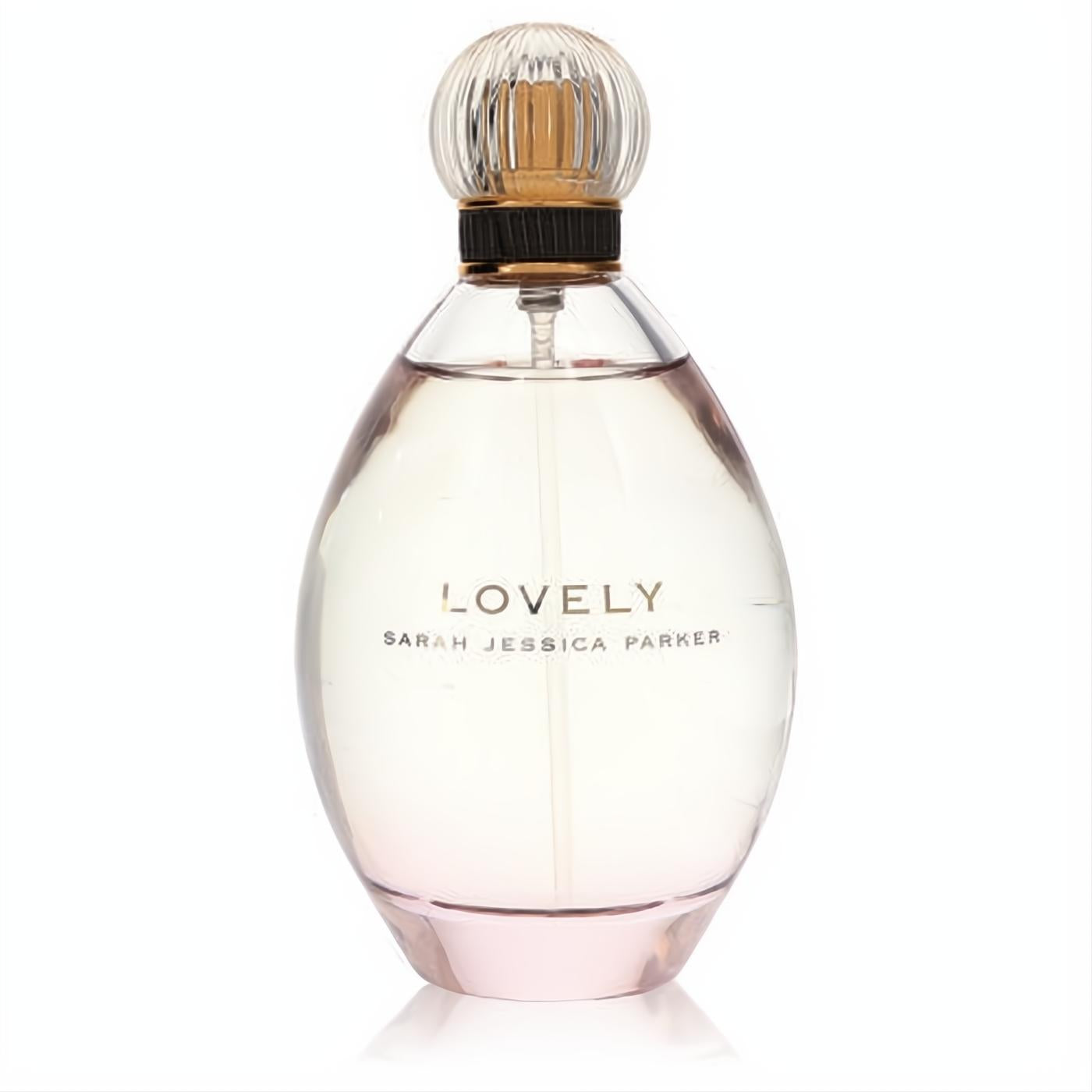 Lovely by SJP 3.4 oz Eau de Parfum tester. Elegant clear glass bottle with blush pink fragrance and chic ribbed gold cap.