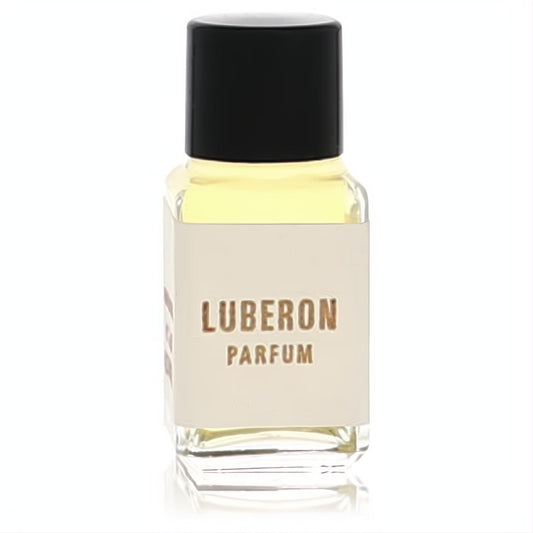 Experience Luberon Pure Parfum: a .23 oz clear glass bottle featuring a sleek black cap and 'LUBERON PARFUM' on a minimalist beige label.