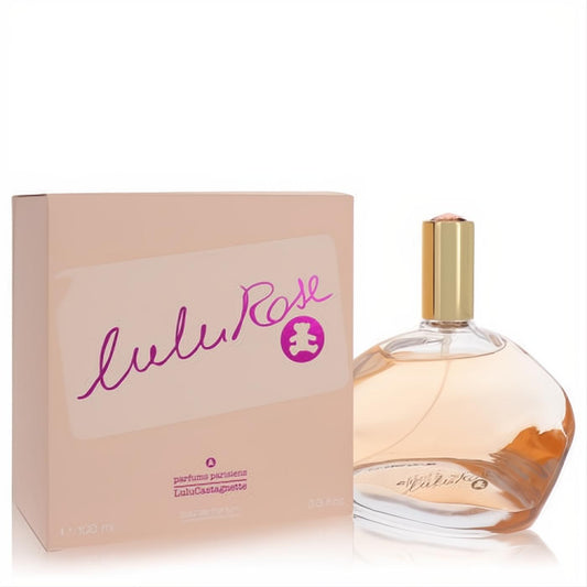 Luxurious Lulu Rose by Lulu Castagnette 3.3 oz EDP. Clear glass bottle, soft pink fragrance, gold cap with gem, and elegant peach box.