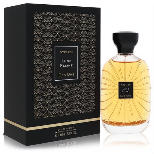 Atelier Des Ors Lune Feline 100ml EDP. Striking black and gold art deco box, clear glass bottle with amber liquid and sunburst design.