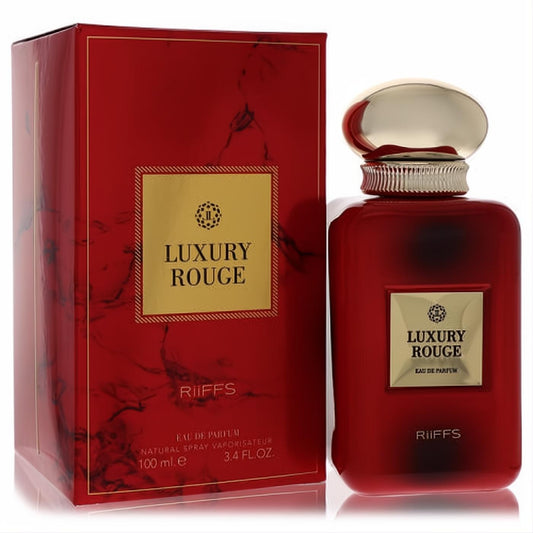 Elegant Luxury Rouge Riiffs 3.4 oz Eau De Parfum. Deep red glass bottle with a lavish gold cap and matching red & gold presentation box.