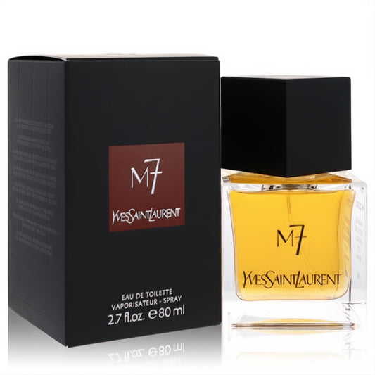 Luxurious YSL M7 men's Eau De Toilette spray, 2.7 oz. Amber liquid in a sleek clear bottle with black cap, beside its elegant black and red box.