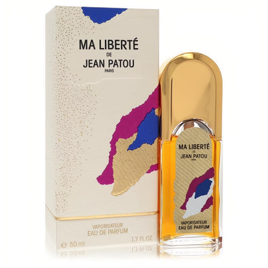 Iconic Ma Liberté by Jean Patou 1.7 oz EDP. Clear bottle, luxurious gold cap, and cream box with vibrant abstract art.