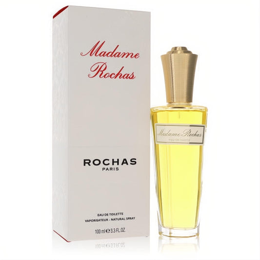Elegant Madame Rochas 3.3 oz EDT spray, clear bottle with gold cap, next to its white box featuring red script.
