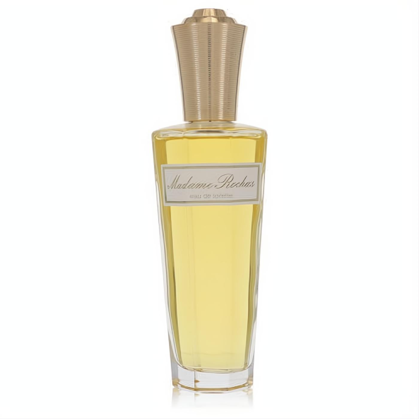 Elevate your scent with Madame Rochas 3.4 oz EDT spray. Clear glass bottle, golden liquid, and luxurious ribbed gold cap.