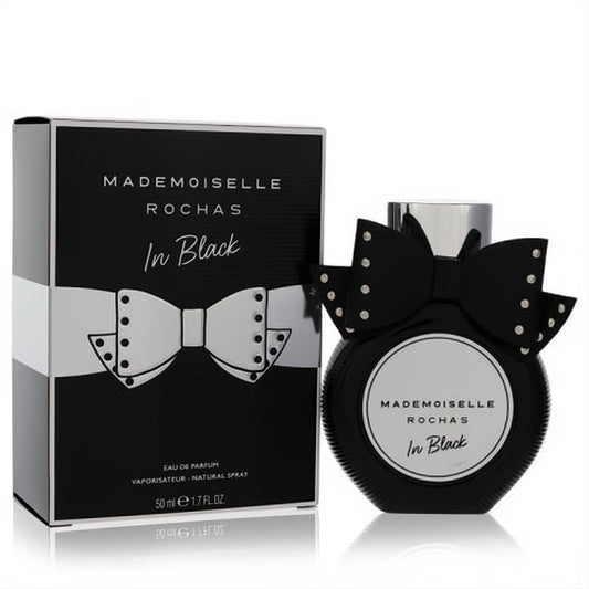 Mademoiselle Rochas In Black 1.7 oz EDP. Bold black ribbed bottle, studded bow, and sleek matching box. A captivating fragrance.