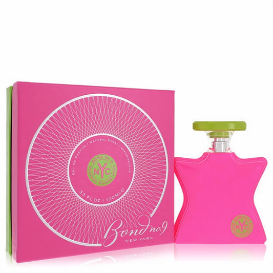 Experience Bond No. 9 Madison Square Park 3.3 oz EDP. A vibrant hot pink star-shaped bottle with a green cap, presented with its matching box.