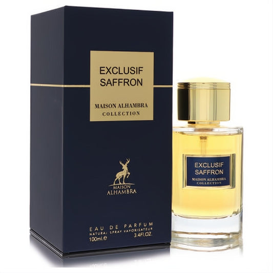 Maison Alhambra Exclusif Saffron unisex EDP, 3.4 oz. Elegant clear bottle with a gleaming gold cap and luxurious dark blue box.