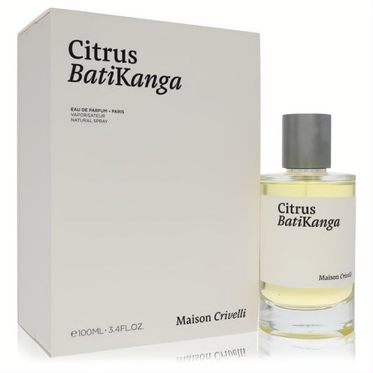 Maison Crivelli Citrus Batikanga 3.4 oz unisex EDT spray. Elegant clear glass bottle with light yellow liquid, white label, grey cap, and sleek white box.