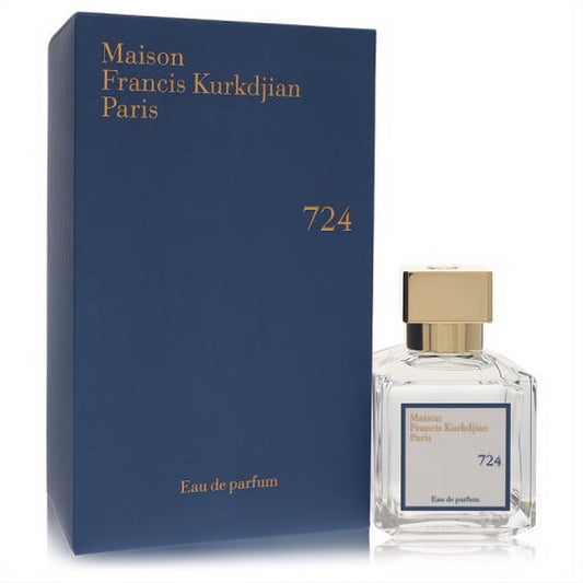 Elegant Maison Francis Kurkdjian Paris 724 unisex Eau de Parfum. Clear glass bottle, gold cap, luxurious navy blue box.
