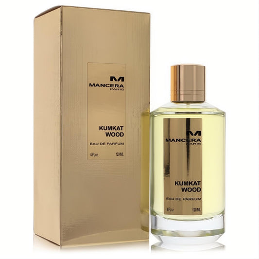 Mancera Kumkat Wood 4 oz unisex EDP. Elegant clear glass bottle with gold cap and light amber liquid, beside its luxurious gold box.