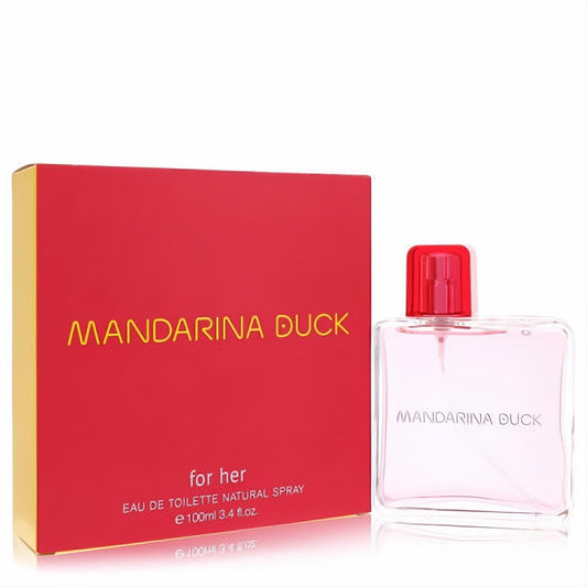 Mandarina Duck 3.4 oz EDT for women. Elegant clear glass bottle with pink fragrance, vibrant red cap, and bold red & gold box.