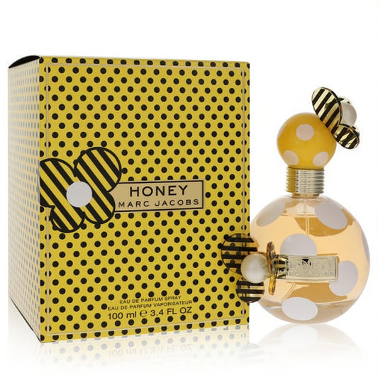 Marc Jacobs Honey 3.4 oz EDP for women. Playful clear glass bottle with white polka dots, a yellow bee cap, and vibrant yellow box.
