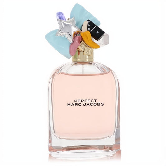 Marc Jacobs Perfect Eau De Parfum: elegant glass bottle, delicate pink liquid, and a vibrant, playful cap adorned with unique charms.