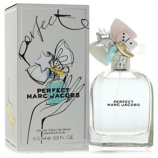 Marc Jacobs Perfect 3.3 oz EDT in a clear bottle with a playful silver cap featuring stars, domino, and ribbons, beside its chic silver box.
