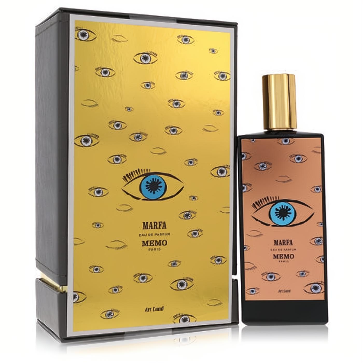 Stunning Marfa by Memo Paris eau de parfum. Black bottle with a unique copper eye design, blue iris, and gold cap, beside its matching box.