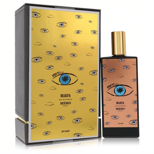 Stunning Marfa by Memo Paris eau de parfum. Black bottle with a unique copper eye design, blue iris, and gold cap, beside its matching box.