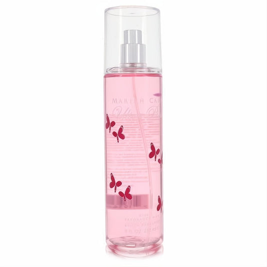 Unleash your inner diva with Mariah Carey Ultra Pink 8 oz fragrance mist. Clear bottle, vibrant pink liquid, and playful red butterflies.