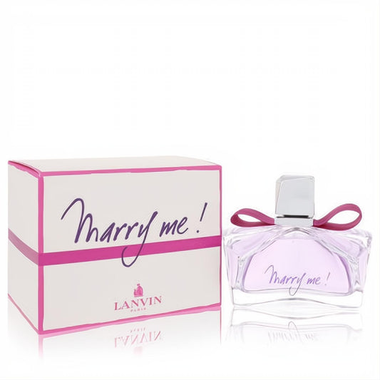 Lanvin Marry Me! 2.5 oz EDP. Elegant glass bottle with light purple liquid, pink ribbon, and matching white box with 'Marry me!' script.