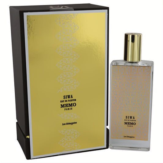 Memo Siwa 2.53 oz EDP spray. Elegant clear glass bottle, gold cap, and matching gold-patterned box for a luxurious fragrance.