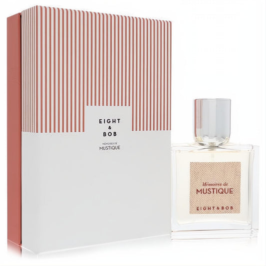 Sophisticated Eight & Bob Memoires de Mustique unisex EDP. Clear glass bottle, silver cap, and elegant white & red striped box.
