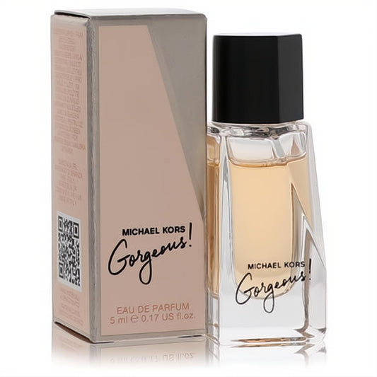 Michael Kors Gorgeous mini EDP 5ml for women. Clear faceted glass bottle with black cap and amber fragrance, beside its chic pink box.