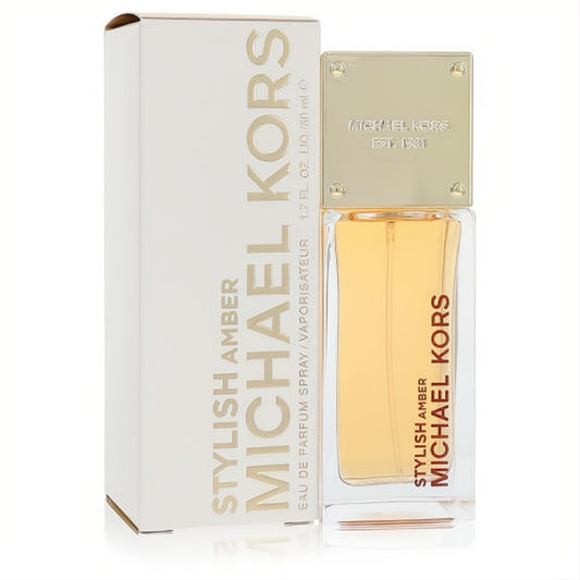 Michael Kors Stylish Amber 1.7 oz women's Eau de Parfum. Golden amber liquid in a sleek glass bottle with a luxurious gold cap and white packaging.
