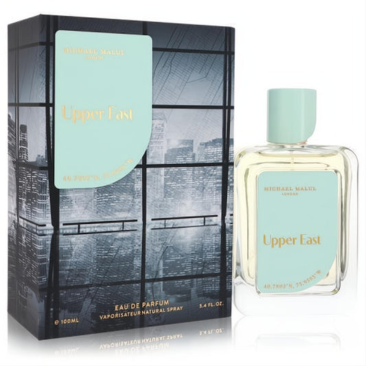 Michael Malul Upper East 3.4 oz Eau De Parfum. Clear glass bottle, chic mint cap, and gold "Upper East" label, next to a stylish cityscape box.