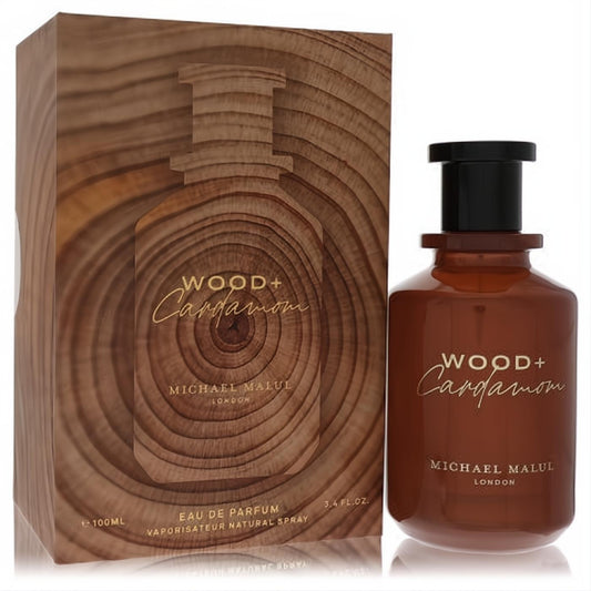 Michael Malul Wood + Cardamom 3.4 oz EDP. Rich amber bottle with sleek black cap, paired with a distinctive wood grain box.