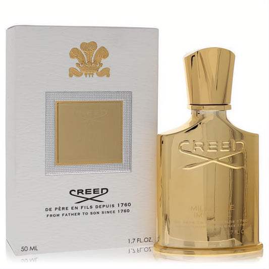 Creed Millesime Imperial 1.7 oz gold EDP spray bottle with its elegant white and gold textured presentation box.