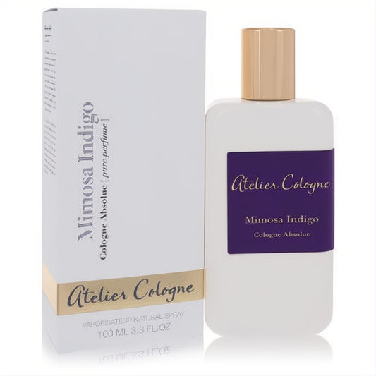 Discover Atelier Cologne Mimosa Indigo 3.3 oz unisex pure perfume. Sleek white bottle, indigo label, gold cap, and elegant white box.