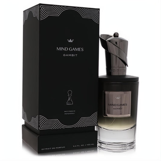 Mind Games Gambit 3.4 oz unisex extrait de parfum. Features a sleek black bottle, unique dark sculpted cap, and elegant matching box.