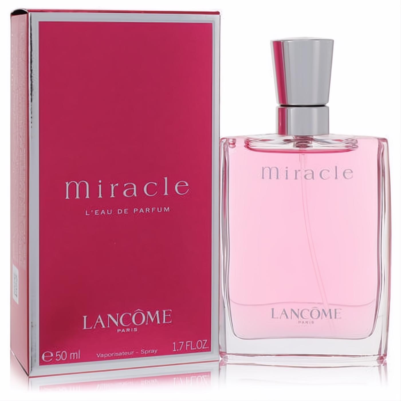 Lancome Miracle Eau De Parfum 1.7 oz spray. Elegant clear bottle with soft pink liquid, silver cap, and vibrant magenta box.