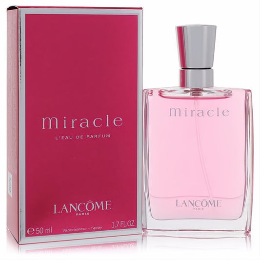 Lancome Miracle Eau De Parfum 1.7 oz spray. Elegant clear bottle with soft pink liquid, silver cap, and vibrant magenta box.