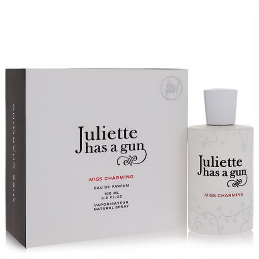 Juliette Has a Gun Miss Charming 3.4 oz Eau De Parfum. Elegant white frosted bottle with subtle floral design and box.