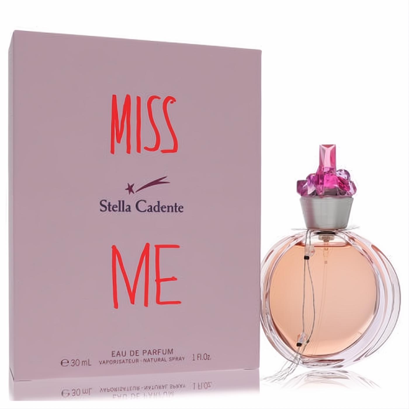 Elegant Miss Me Stella Cadente 1 oz EDP. Pink box, round glass bottle with radiant peach perfume, topped with a dazzling pink crystal cap.
