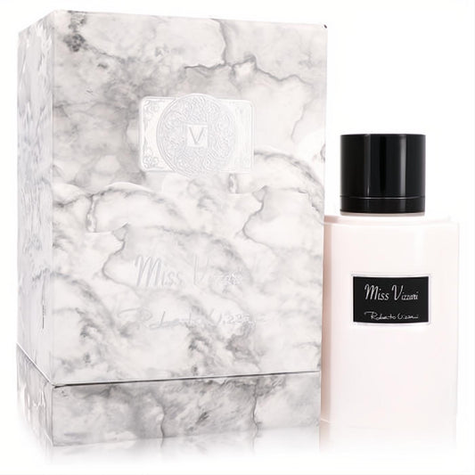 Elegant Miss Vizzari 3.7 oz women's EDP in a sleek blush pink bottle with a black cap, beside its luxurious marble box.