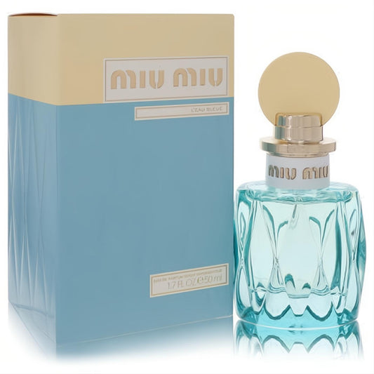 Miu Miu L'eau Bleue 1.7 oz women's Eau de Parfum. Elegant faceted light blue bottle, gold cap, and matching beige/blue box.