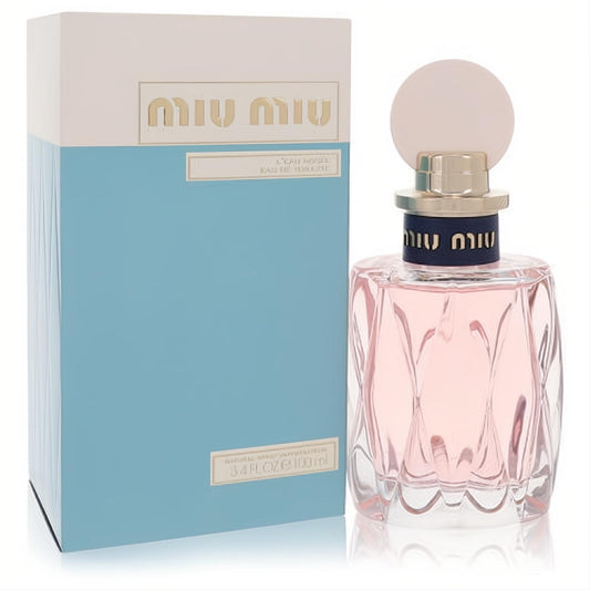 Miu Miu L'eau Rosee 3.4 oz Eau De Toilette. Elegant pink faceted glass bottle with gold accents and a stylish light blue box.