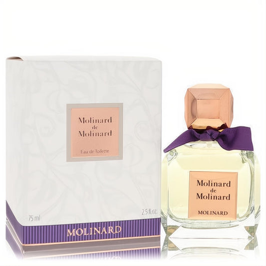 Molinard De Molinard 2.5 oz EDT in a clear glass bottle with a faceted rose gold cap, purple ribbon, and matching white box.