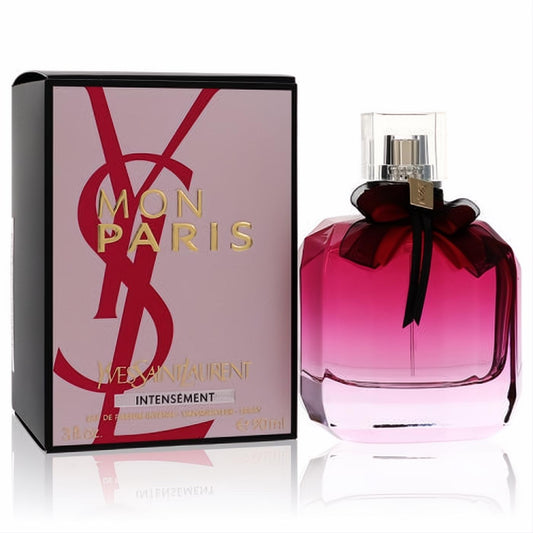 YSL Mon Paris Intensement 3 oz EDP. Elegant pink ombre faceted bottle with black ribbon, next to its striking black and pink box.