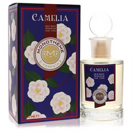Chic Monotheme Camelia 3.4 oz EDT spray, clear bottle with light amber liquid, beside its navy floral box featuring exquisite white camellia blossoms.