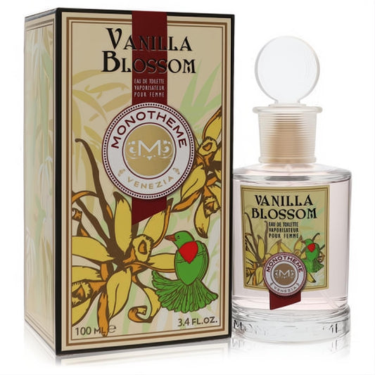 Monotheme Vanilla Blossom 3.4 oz EDT for women. Clear glass bottle with light pink fragrance, elegant floral label, and matching box.